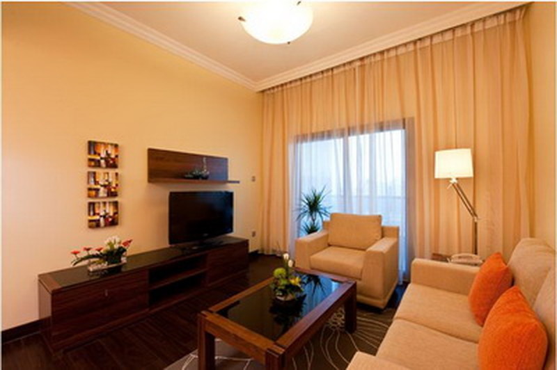 Гостиная в One Bedroom Deluxe Apartment