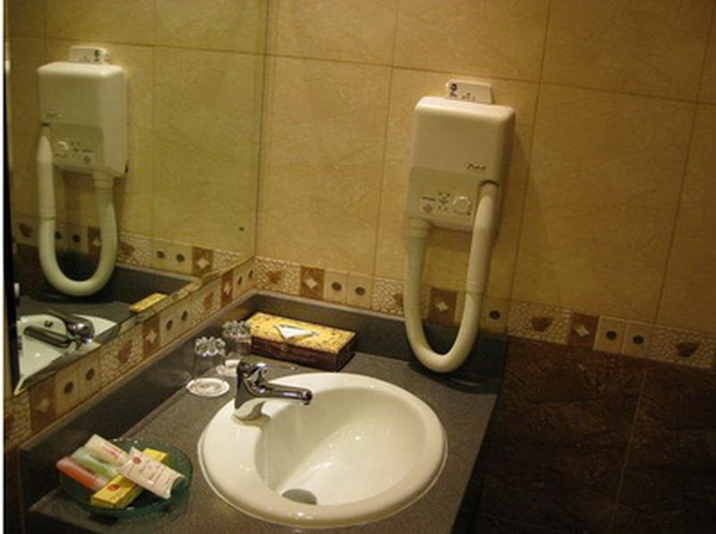 Ванная комната в Regent Beach Dubai 